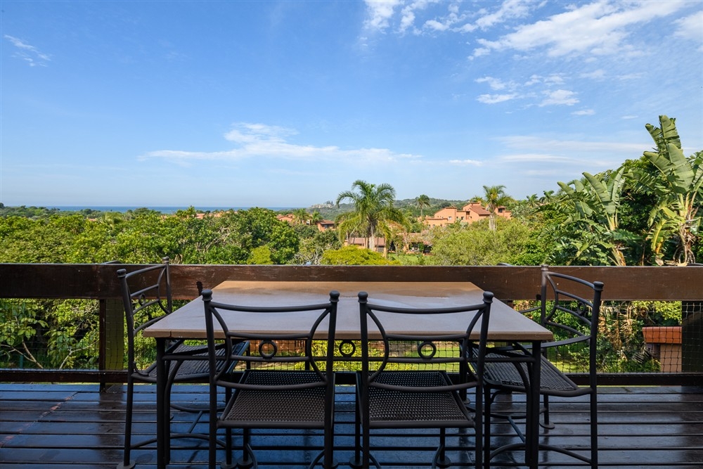 Villa 2409: Deck with surprisingly beautiful views of the Blue flag beach and well manicured  garden.